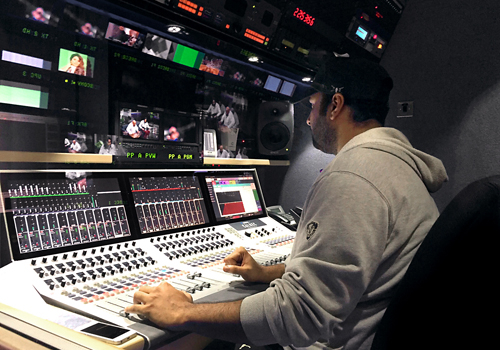 An audio operator at KTV works with the Calrec Summa audio console. An audio operator at KTV works with the Calrec Summa audio console.