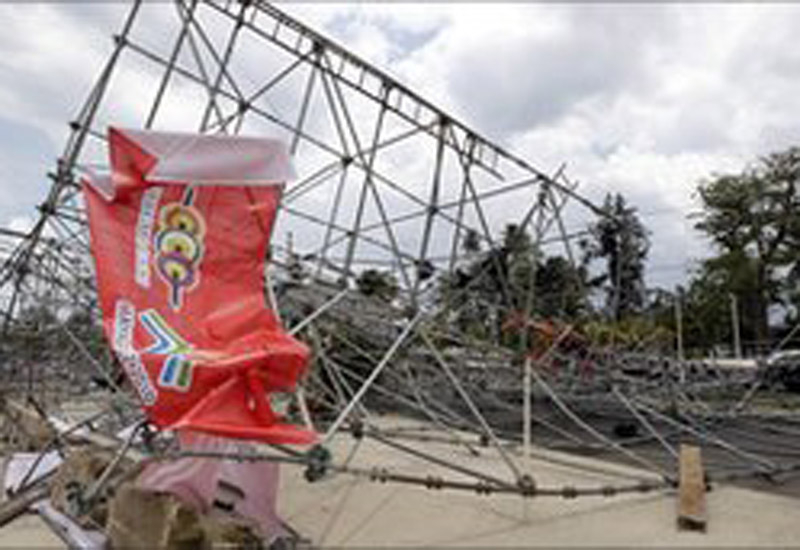 Scaffolding and light towers collapsed in the storm, injuring five people. Scaffolding and light towers collapsed in the storm, injuring five people.