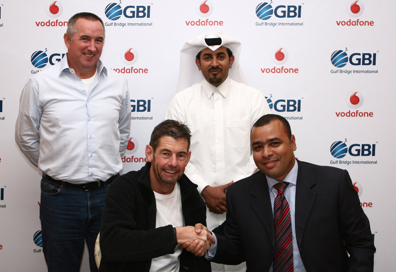 Vodafone Qatar CEO Graham Maher shakes hands with GBI CEO Ahmed Mekky after signing the cable landing deal. Vodafone Qatar CEO Graham Maher shakes hands with GBI CEO Ahmed Mekky after signing the cable landing deal.