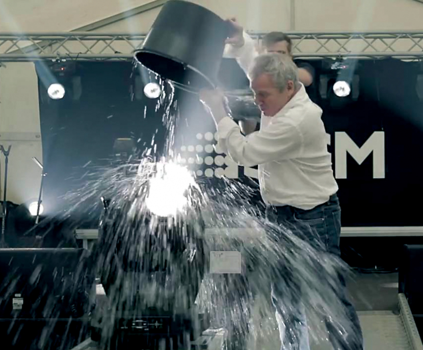 Peter Johansen gives the waterproof moving head a soaking in the name of charity. Peter Johansen gives the waterproof moving head a soaking in the name of charity.