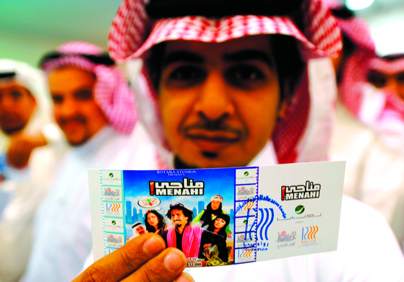A Jeddah film buff pictured with his ticket to the screening of Menahi A Jeddah film buff pictured with his ticket to the screening of Menahi