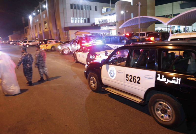 Police guard the Scope TV studios after the attack in Kuwait City. Police guard the Scope TV studios after the attack in Kuwait City.