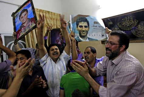 The family and friends of Mohammad Assaf celebrate after he won the final of the Arab Idol competition. (AFP/Getty Images) The family and friends of Mohammad Assaf celebrate after he won the final of the Arab Idol competition. (AFP/Getty Images)