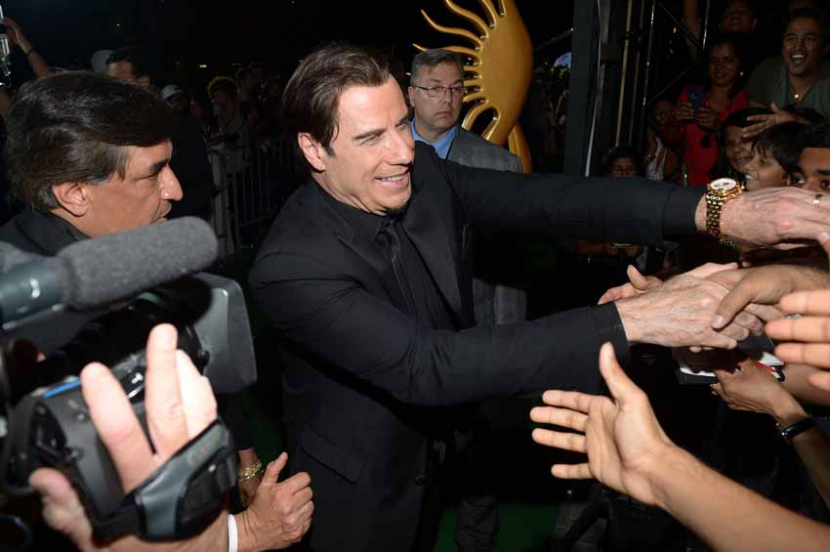 John Travolta greets fans before the IIFA Awards at Raymond James Stadium on April 26 in Tampa, Florida.(Photo: Gustavo Caballero/Getty Images) John Travolta greets fans before the IIFA Awards at Raymond James Stadium on April 26 in Tampa, Florida.(Photo: Gustavo Caballero/Getty Images)