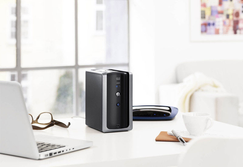 The Linksys by Cisco Media Hub automatically gathers digital media from multiple sources around the home. The Linksys by Cisco Media Hub automatically gathers digital media from multiple sources around the home.