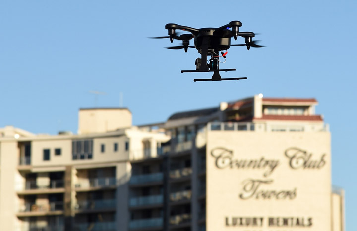 A Ghost drone by EHang flies at the 2015 International CES outside the Las Vegas Convention Center on January 8, 2015 in Las Vegas, Nevada. The Ghost can be piloted by a smartphone without a remote control and only needs one click to take off, return and land. (Photo by Ethan Miller/Getty Images) IN PICS: Top drone tech at CES 2015