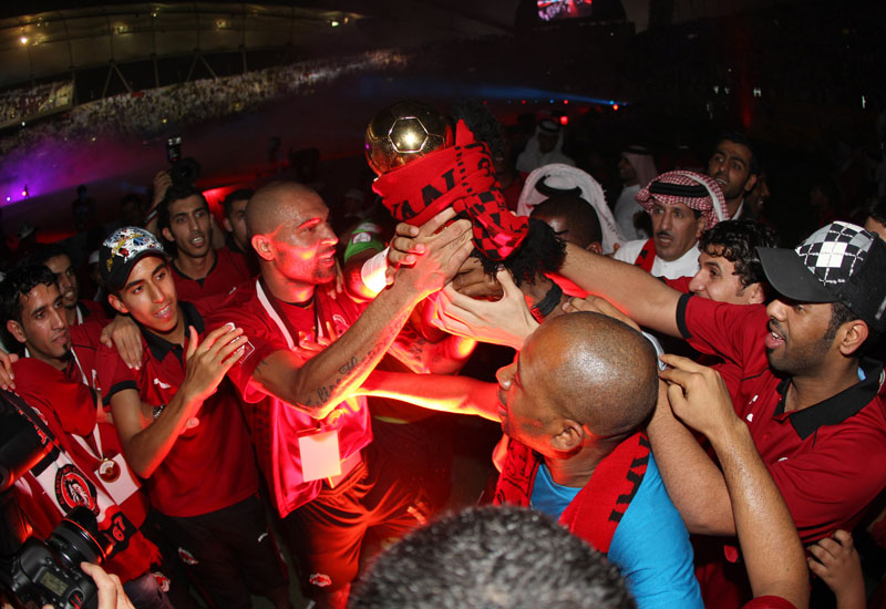Al Rayyan's star player Alfonso Alves holds the Emir's Cup. Al Rayyan's star player Alfonso Alves holds the Emir's Cup.