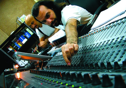 Farzin (foreground) at work in the Pro Sound Design studio. Farzin (foreground) at work in the Pro Sound Design studio.