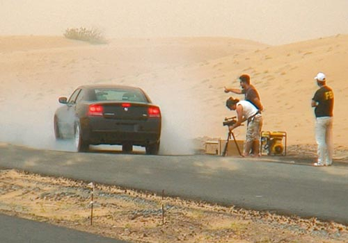 A Dodge Charger performs a burnout for Bouri's self funded film The Twelfth Task; Bouri claims that without funding, the Dubai film industry is also h A Dodge Charger performs a burnout for Bouri's self funded film The Twelfth Task; Bouri claims that without funding, the Dubai film industry is also h