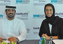 Noura Al Kaabi (right) and Al Tareq Al Ameri signing the MoU. Noura Al Kaabi (right) and Al Tareq Al Ameri signing the MoU.