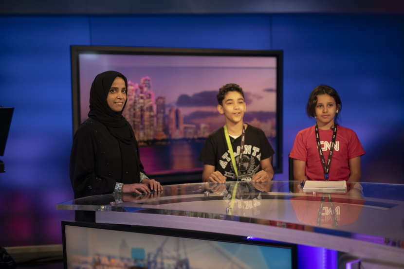 H.E. Maryam Eid AlMheiri, CEO of Media Zone Authority – Abu Dhabi and twofour54 and children from twofour54’s annual Summer Camp enjoying a session at the CNN Headquarters in Abu Dhabi H.E. Maryam Eid AlMheiri, CEO of Media Zone Authority – Abu Dhabi and twofour54 and children from twofour54’s annual Summer Camp enjoying a session at the CNN Headquarters in Abu Dhabi