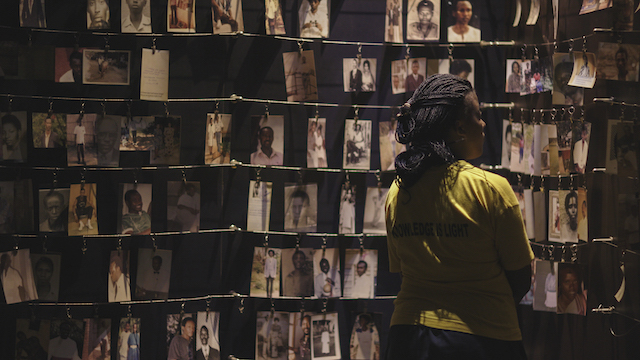 A visitor looks at the photo exhibit at the Kigali Genocide Memorial which documents the 1994 Genocide against the Tutsi population in Rwanda A visitor looks at the photo exhibit at the Kigali Genocide Memorial which documents the 1994 Genocide against the Tutsi population in Rwanda
